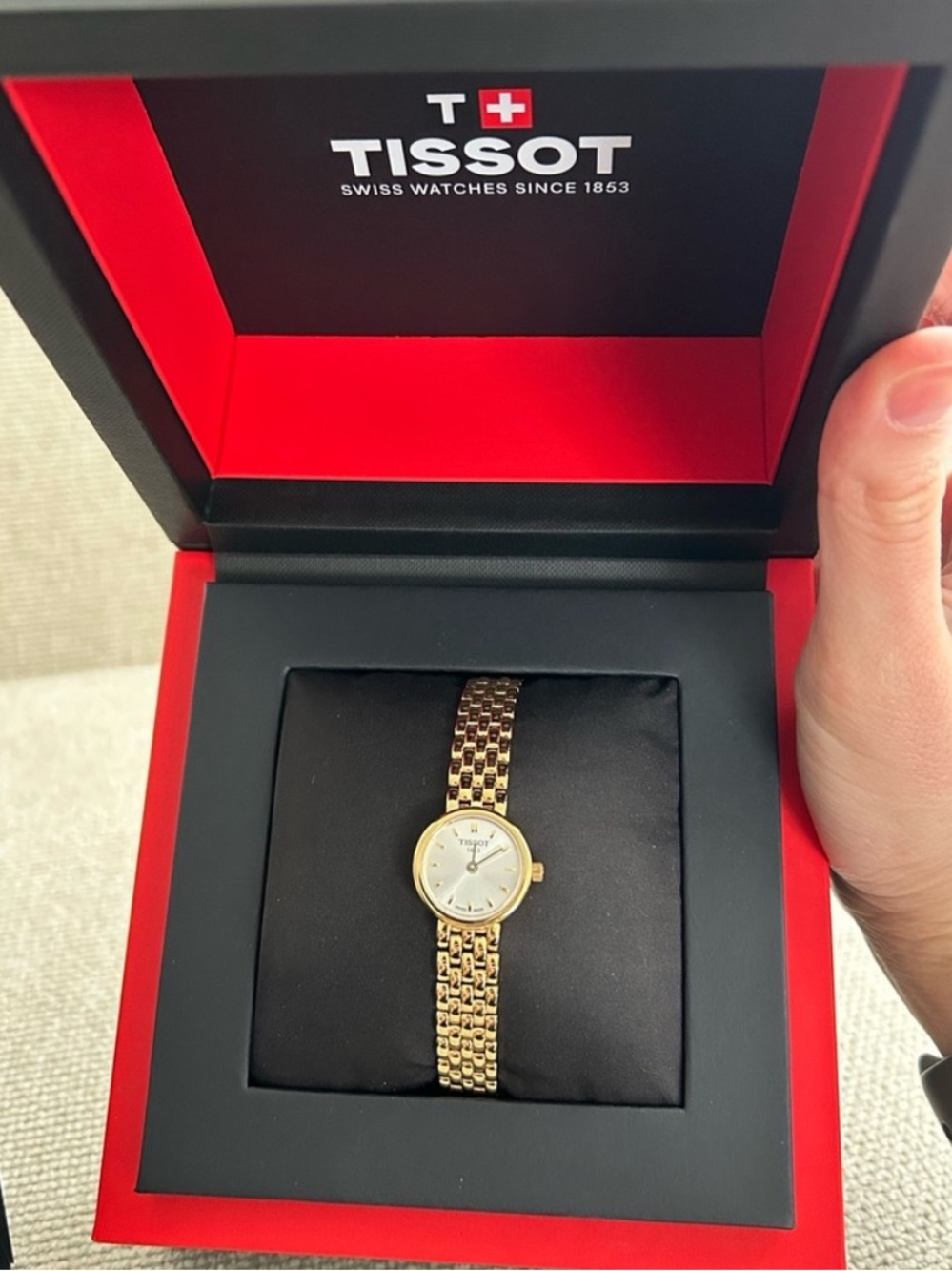 Tissot Lovely round gold watch